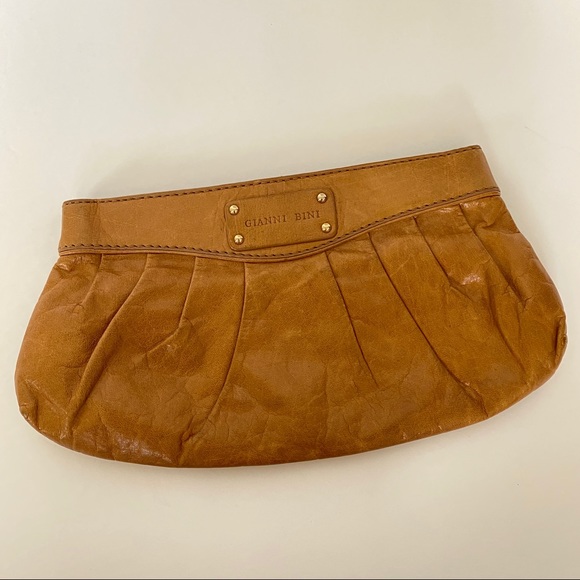 Gianni Bini Handbags - Gianni Bini tan leather clutch bag